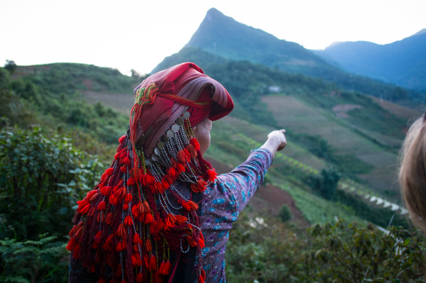 Red Dao woman along Buffalo Way at Topas Ecolodge in Sapa valley, Vietnam